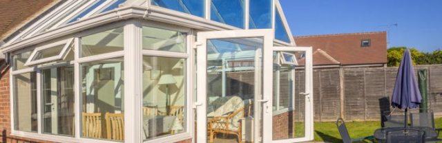 Custom Glass Roof Conservatory Installation by Discovery Windows in Stoke-On-Trent