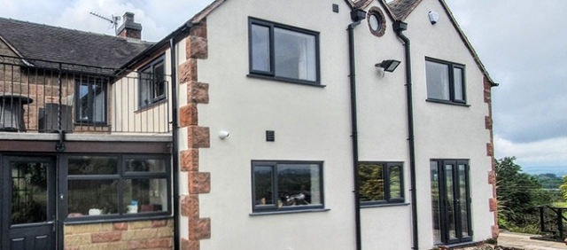 Energy-Efficient Grey uPVC Window Installation by Discovery Windows in Stoke-On-Trent